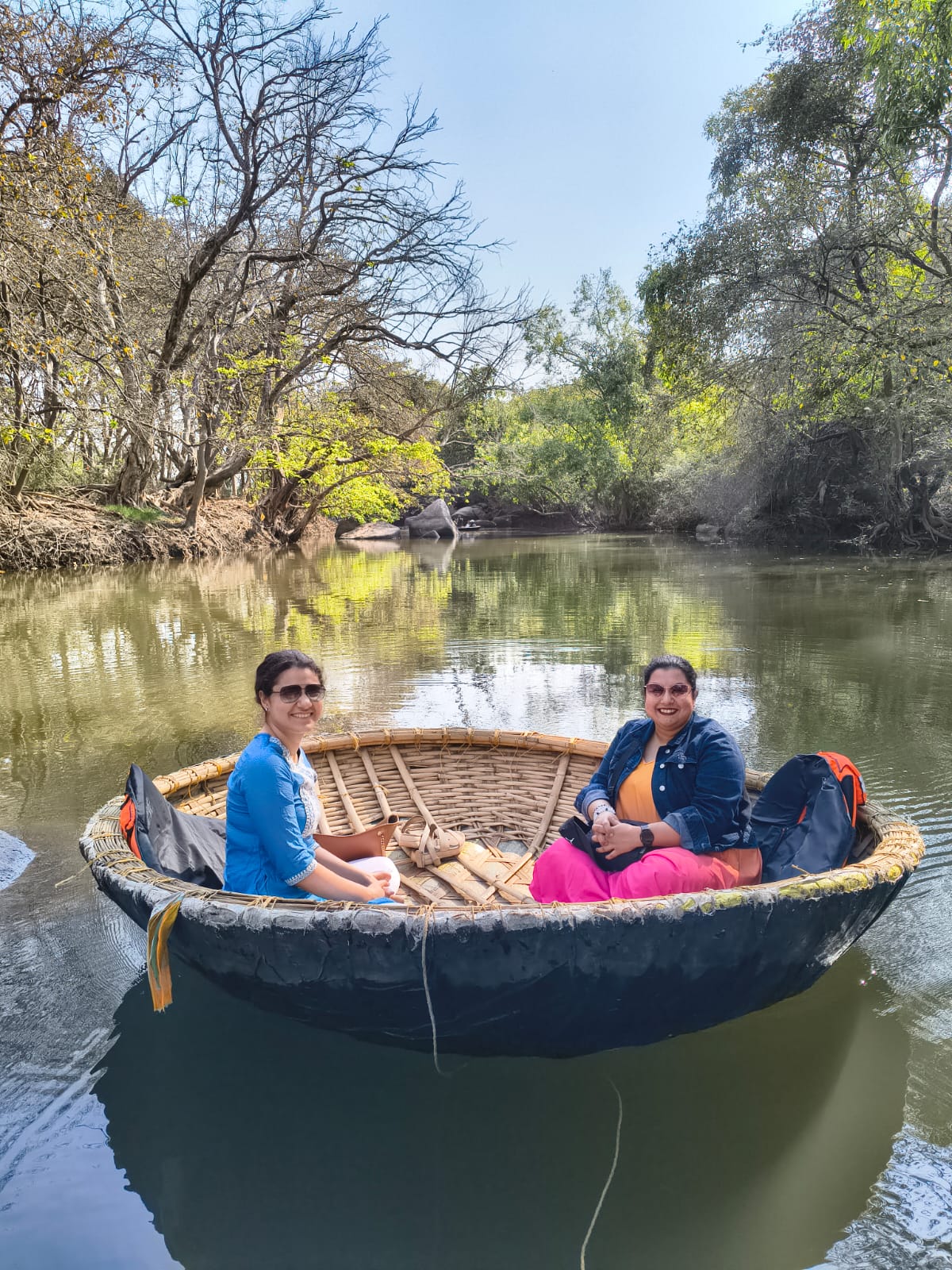 Group in coracle on Sonapur Lake Hampi tour