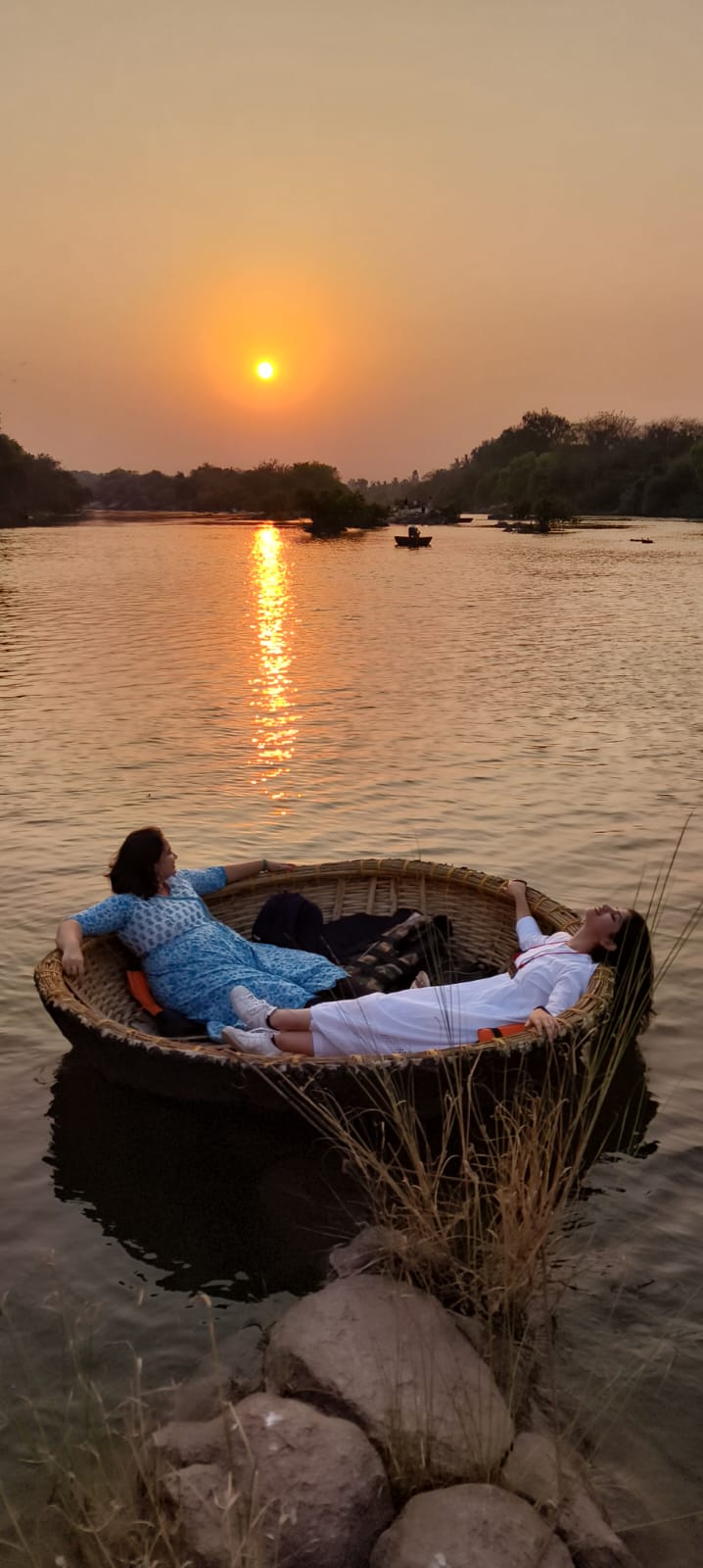 Coracle ride at sunset on Sanapur Lake Hampi